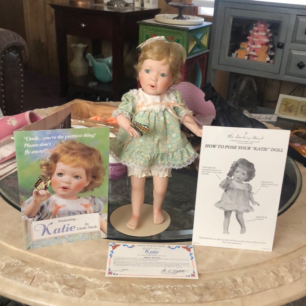 Vintage Style Porcelain Doll in Floral Dress

By the Danbury Mint
